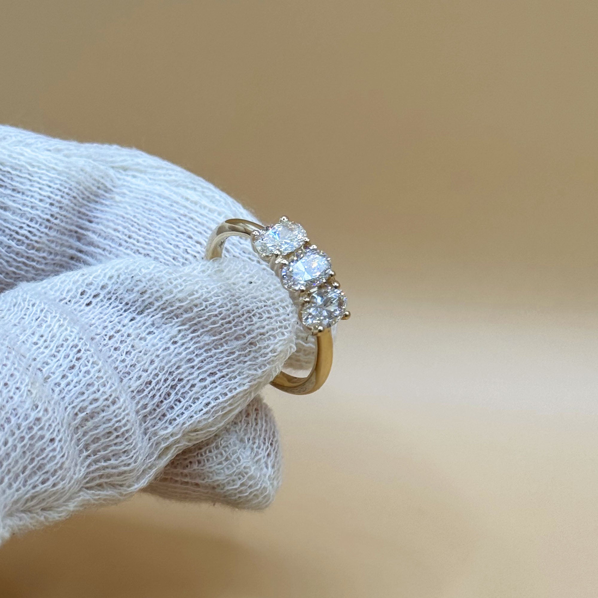 Drievoudige ovale diamant - 14-karaats gouden ring met 1,2 karaat diamant