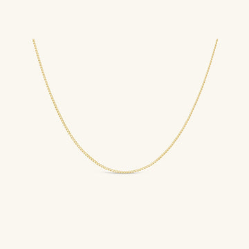 The MiJu Official minimalistic necklace in 9k solid gold.