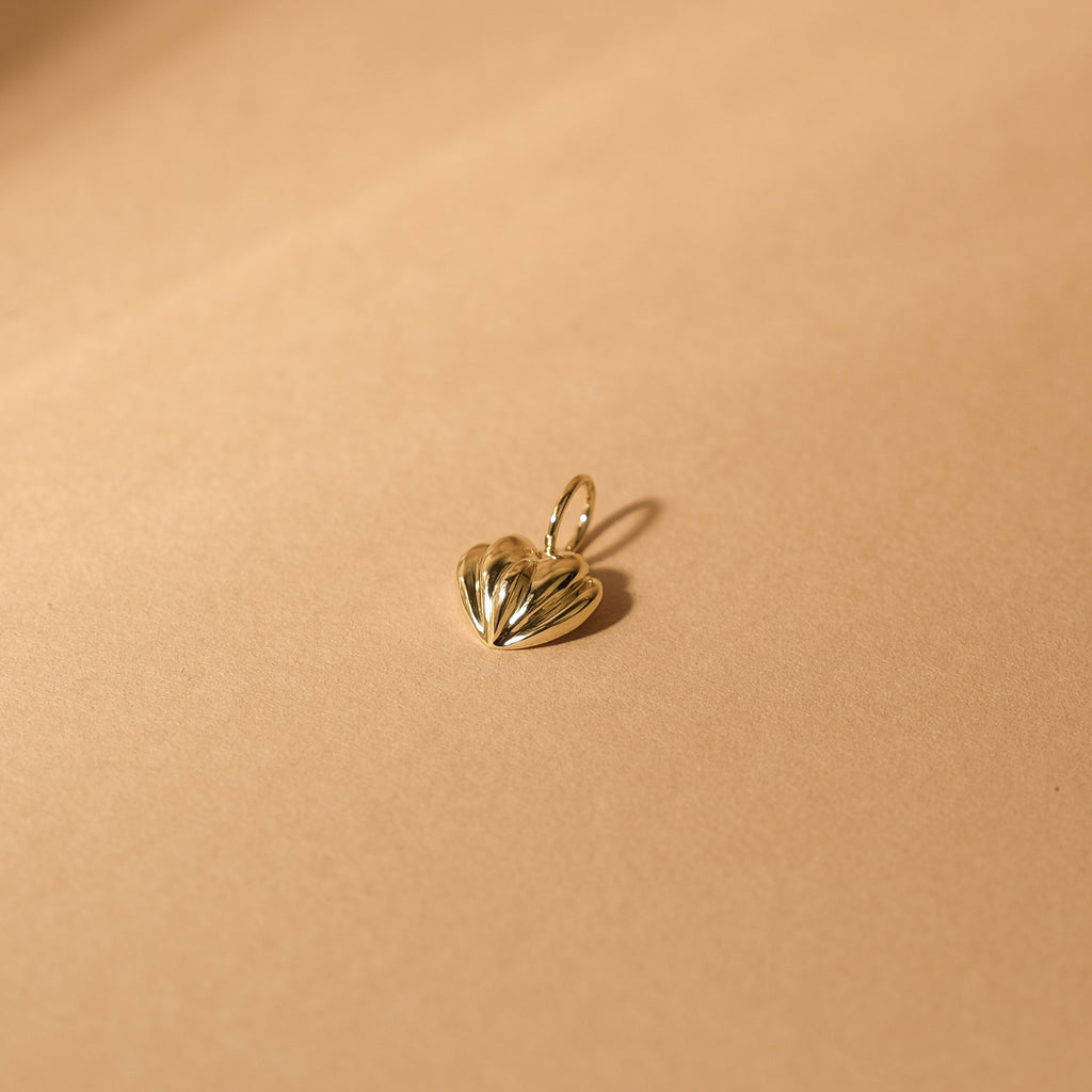 A timeless MiJu Official heart shaped necklace pendant design with a vintage twist.